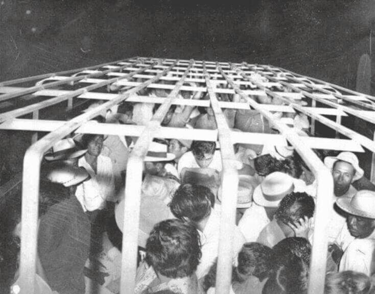 The u. S. Border patrol packed mexican immigrants into trucks when transporting them to the border for deportation.