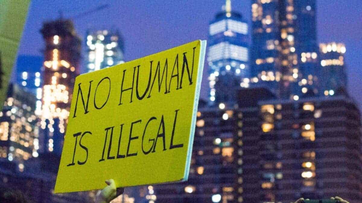 img 5338 e1722909678617 Immigration and daca protections protest sign that says no human is illegal