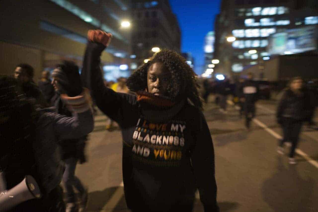img 6856 e1725295442831 A black lives matter protester in the street wearing a sweatshirt that says “i am proud of my blackness and my values. ”