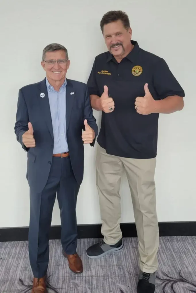 crazy sheriff post2 Photo of the sheriff with mike flynn (facebook)