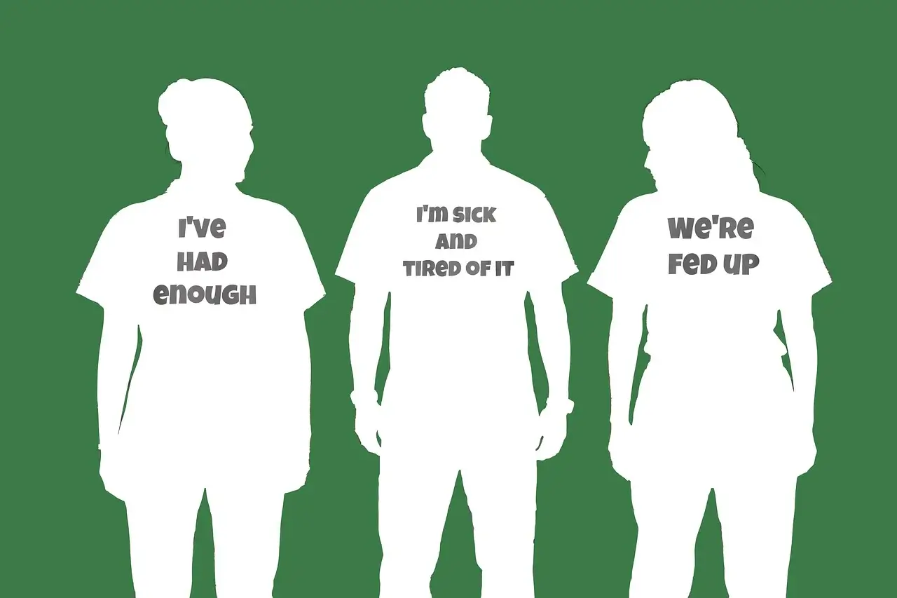 grassroots activism fight oligarchy Grassroots activism three people wearing t-shirts with slogans