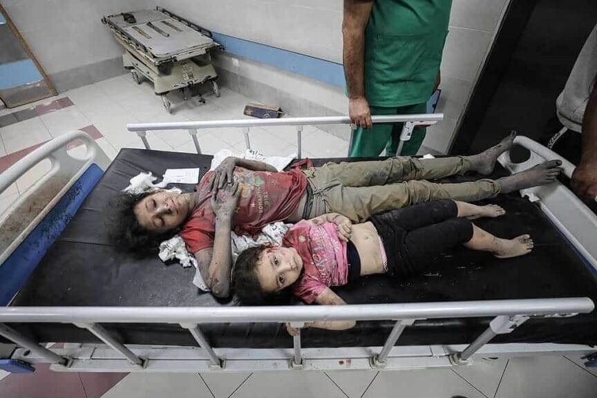 Palestinian children await treatment at a hospital in gaza