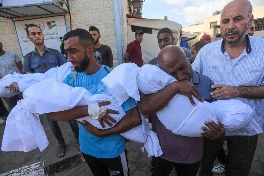 Man mourns children in Gaza who were killed in camp bombing. refuseniks