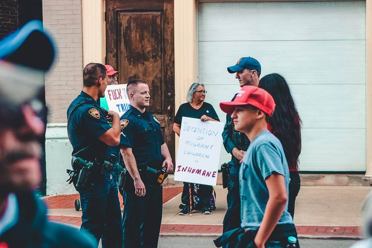 anti trump protesters Protesters of trump speaking to police officers.