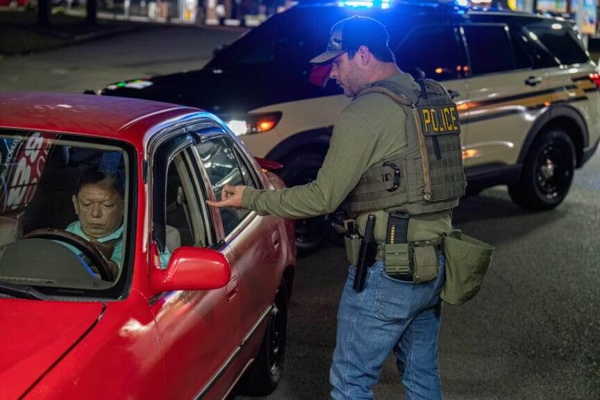 nashville ice traffic stops An immigration and customs enforcement agent pulls a driver over in nashville’s madison community on friday, march 9, 2025. A tennessee highway patrol vehicle is parked behind the man.