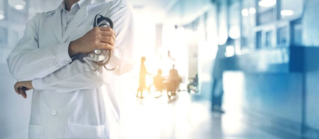 Life-saving abortions a doctor standing in a hospital hallway