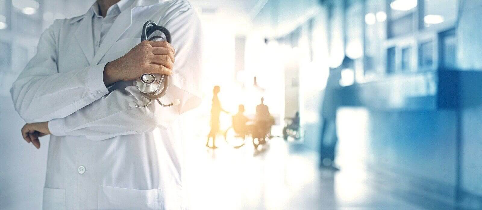 Life-saving abortions a doctor standing in a hospital hallway