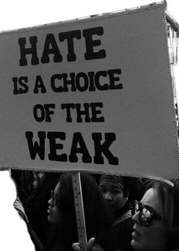 img 0986 Pro-democracy community. Protest sign that says hate is a choice of the weak. It’s