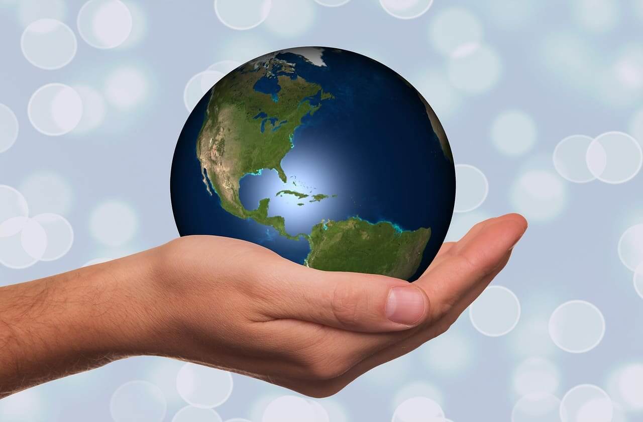 global south Environmental activities for kids. Global south, a hand holding the planet