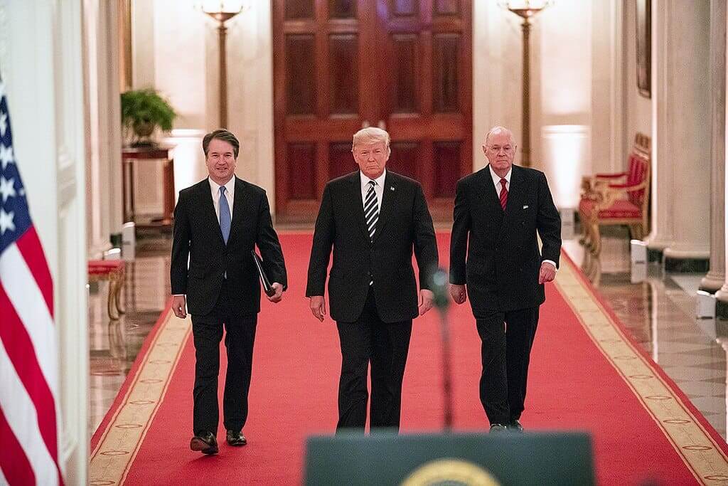 trump justices walking Trump walking with brett kavanaugh and a retired justice