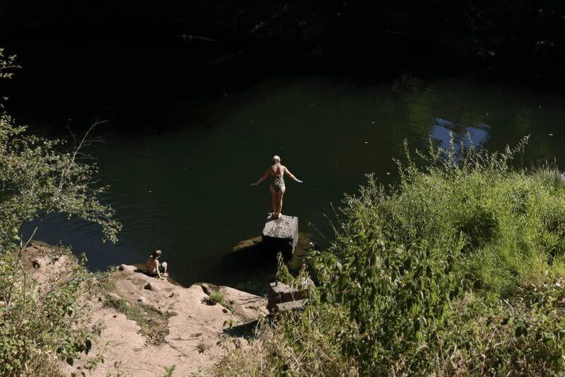 woman diving into lake A woman about to dive into a lake in sheridan