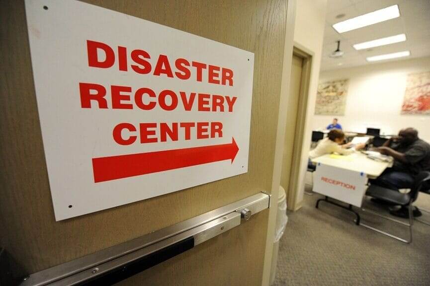 Disaster recovery center sign. Trump is denying disaster aid.
