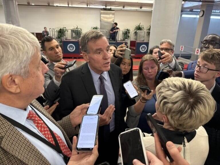Senator mark warner talks to the press about the shutdown.