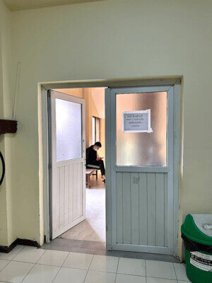 waiting room Migrant worker sitting in waiting room