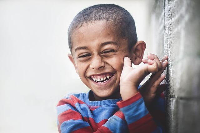 boy smiling Little boy smiling kids with mental health issues
