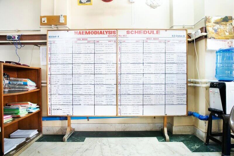 hemodialysis schedule Migrant workers hemodialysis schedule on a whiteboard