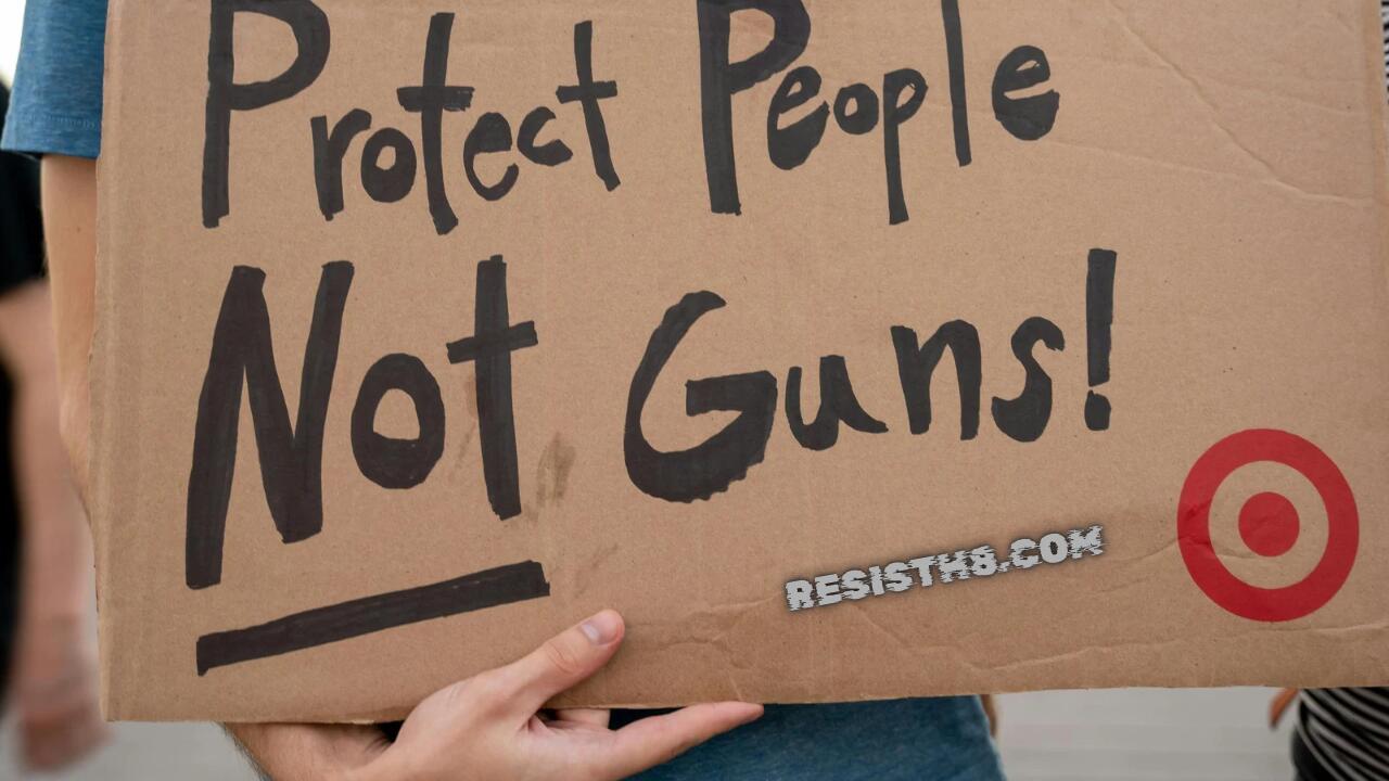 Brown university search for the shooter. Protest sign that says protect people not guns