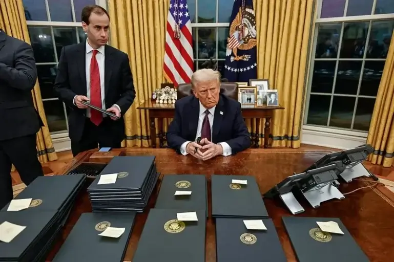 trump executive orders Trump surrounded by executive orders