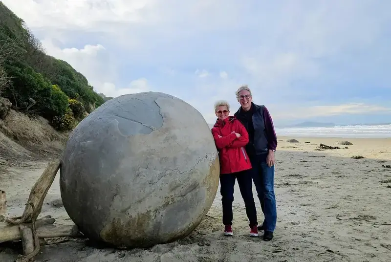 couple on beach uncloseted Trump labeling trans people terrorists story image of couple