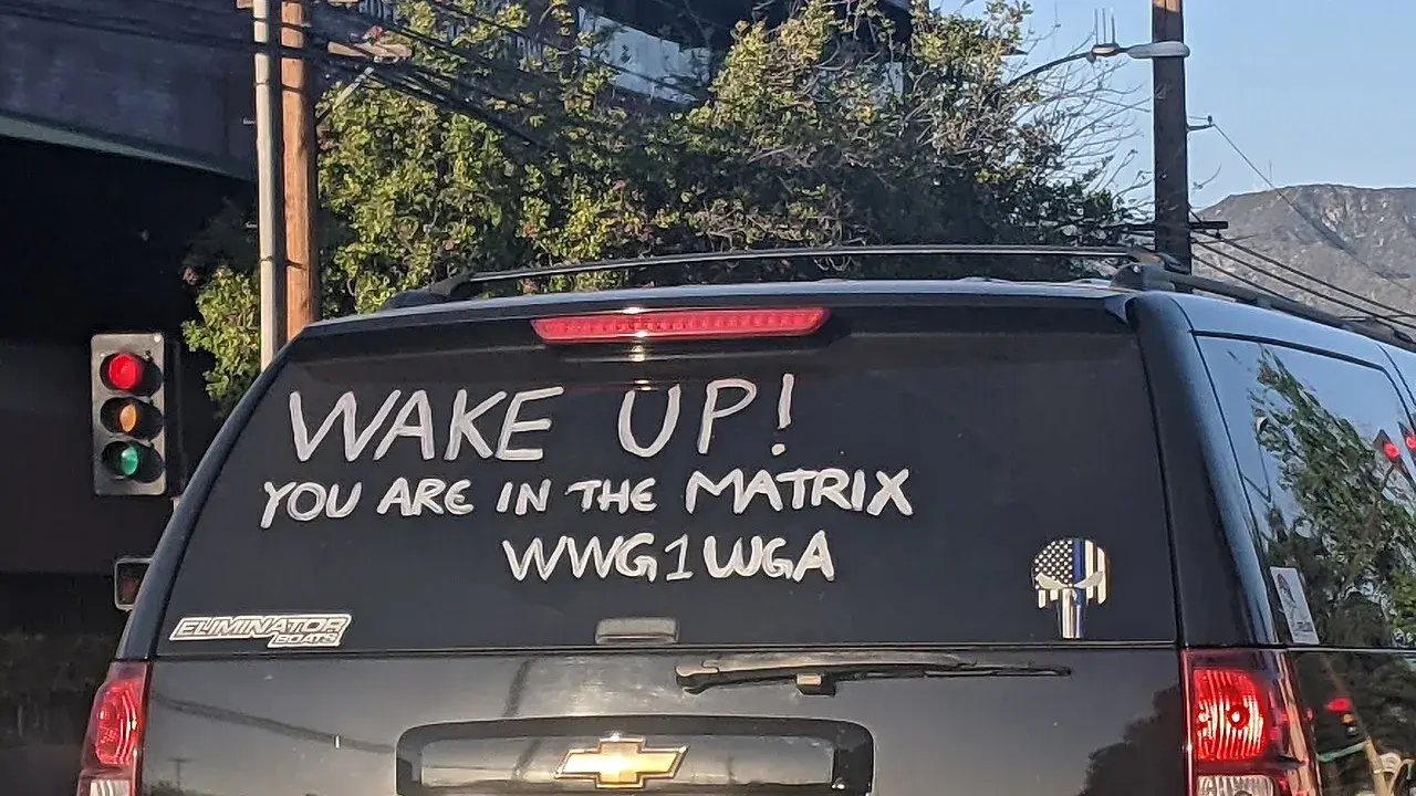 qanon suv cali Qanon writing about deep state on rear window of an suv