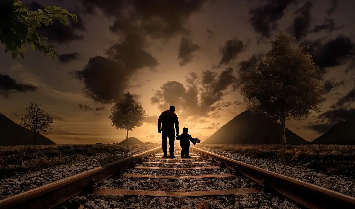 father son tortured baby Israeli soldiers tortured an 18-month-old. Father and son walking in railroad tracks at sunset