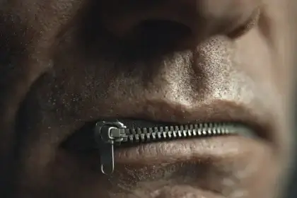 Ndas for federal workers. Man with mouth zipped shut