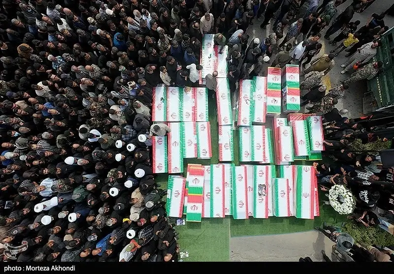funeral minab elementary Aerial view of caskets holding bodies of victims of the school bombing in iran.
