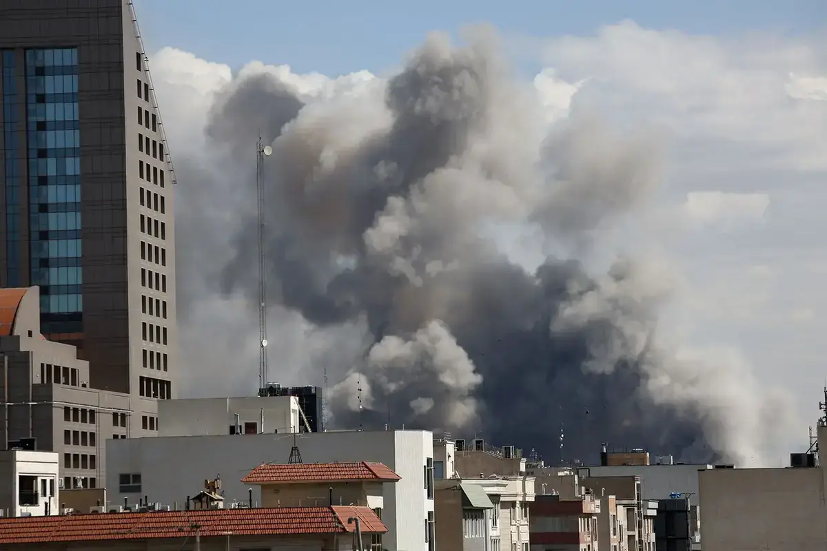 Smoke from a strike in tehran. Carbon emissions
