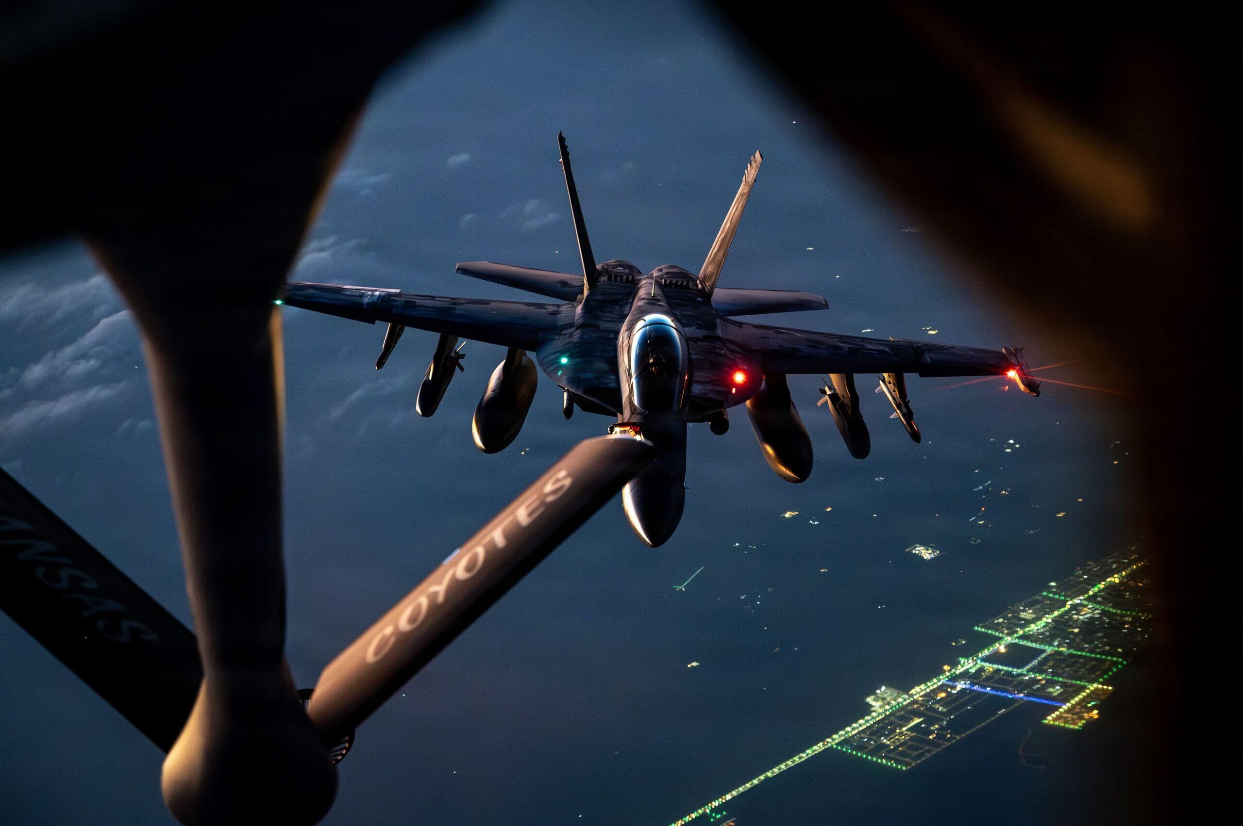 A u. S. Navy f/a-18f super hornet aircraft refuels from a u. S. Air force kc-135 stratotanker aircraft during a mission in support of operation epic fury over the u. S. Central command area of responsibility, march 8, 2026. (u. S. Air force photo)