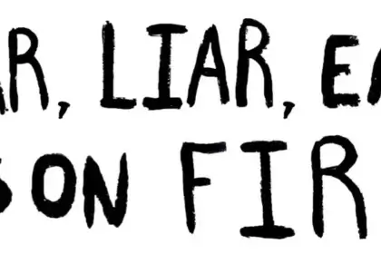 Climate protest sign about lying in politics