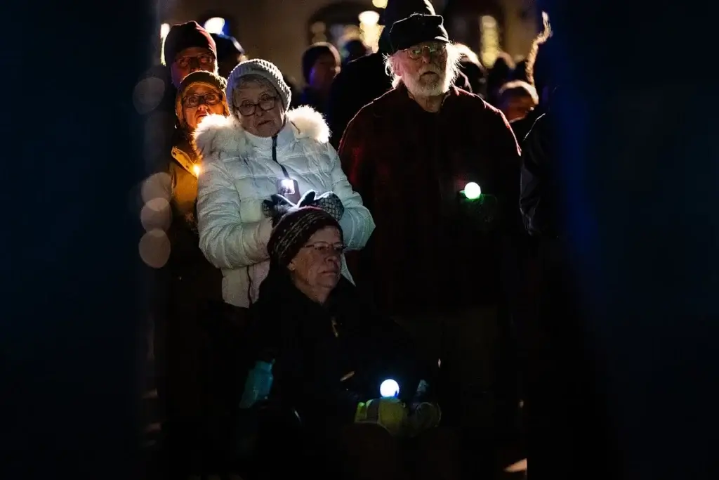 Candlelight vigil minnesota sues trump admin
