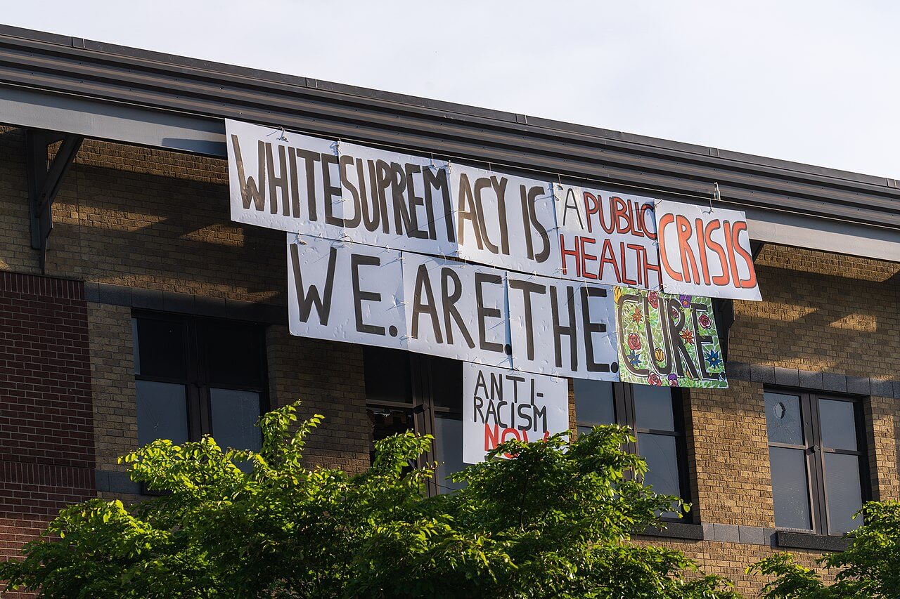 white supremacy minneapolis pd Sign hanging on the minneapolis police department during the civil unrest following the killing of george floyd