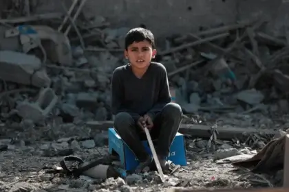 Rats are biting babies in gaza. A child sitting in the rubble.