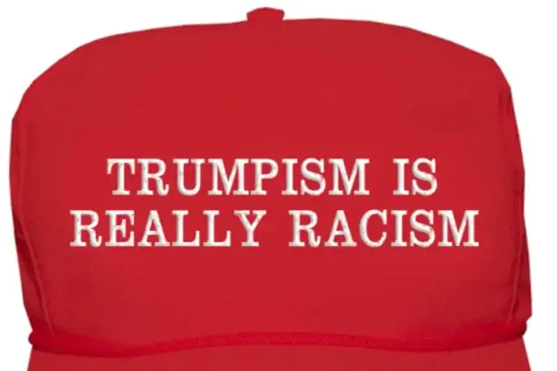 Maga hat that says trumpism is really racism. Justin pearson’s speech