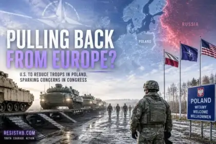 Trump canceled active deployment of troops to poland. A polish soldier watches us troops walking away.
