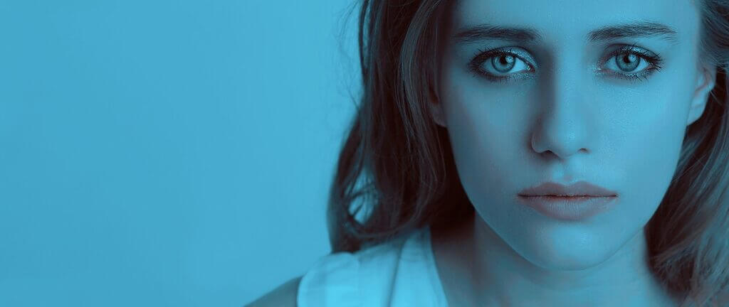 female pastors blue Woman’s face on a blue background. Churches with female pastors are banned