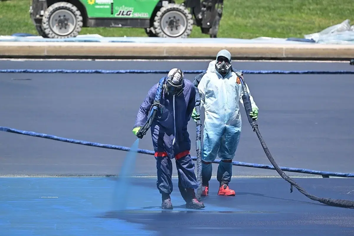 Before the reflecting pool algae, they painted it blue