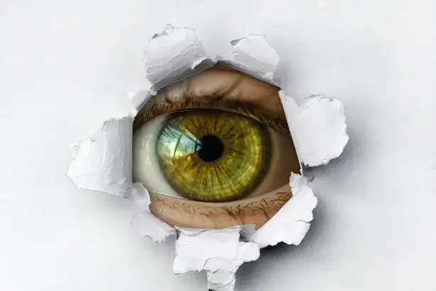 Israel spying eye through torn paper