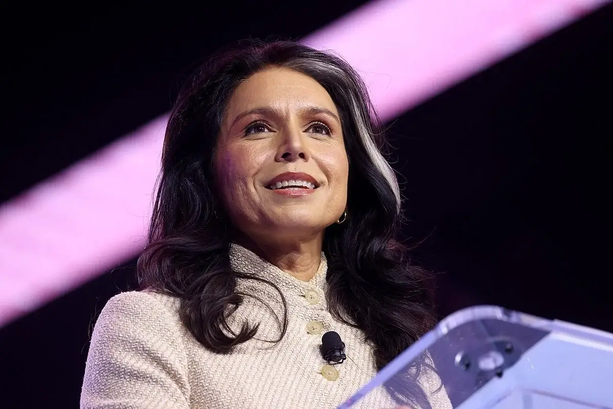Cult leader controlled tulsi gabbard, seen here speaking at a convention in arizona