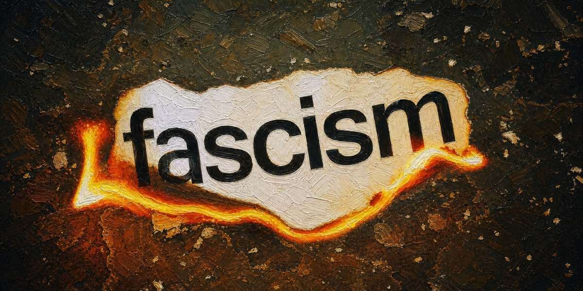Peeling paint on fire exposing the word fascism under.