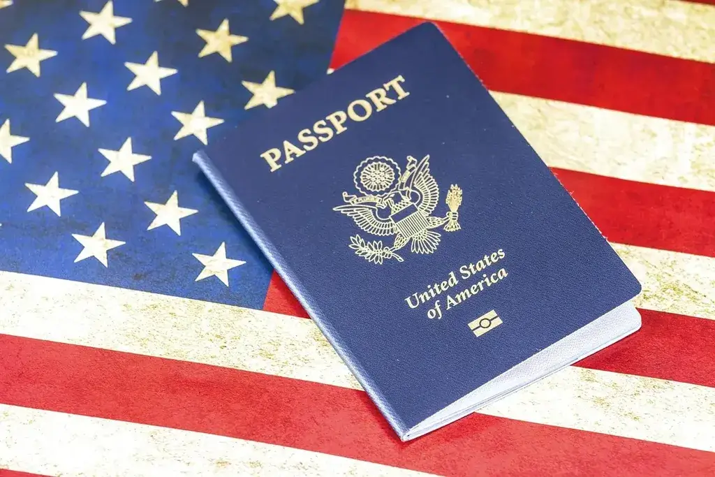 American flag and us passport represents spouses of us citizens